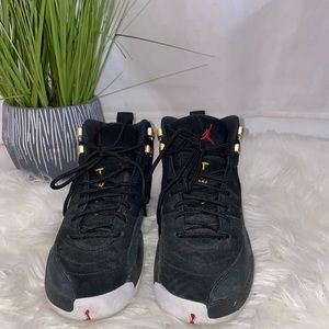 Jordan 12 reverse taxi black and white.